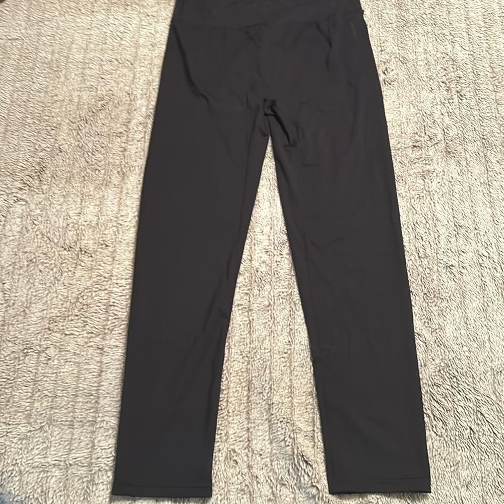 All black yoga leggings/tights stretchy material Size M